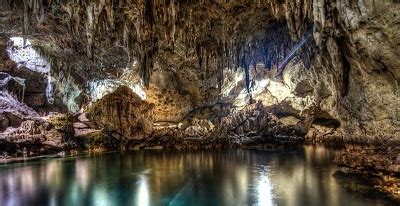 The Hidden Wonder of Hinagdanan Cave: An Aquatic Escape and Geological Marvel!